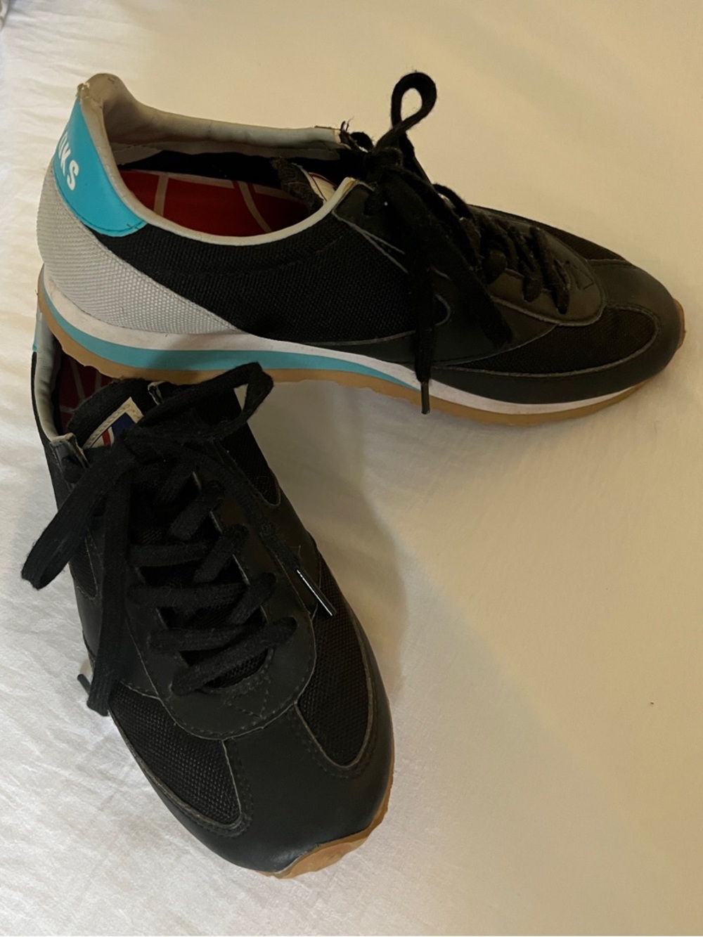 Brooks Women's Black Sneakers with Teal Heel Panel
